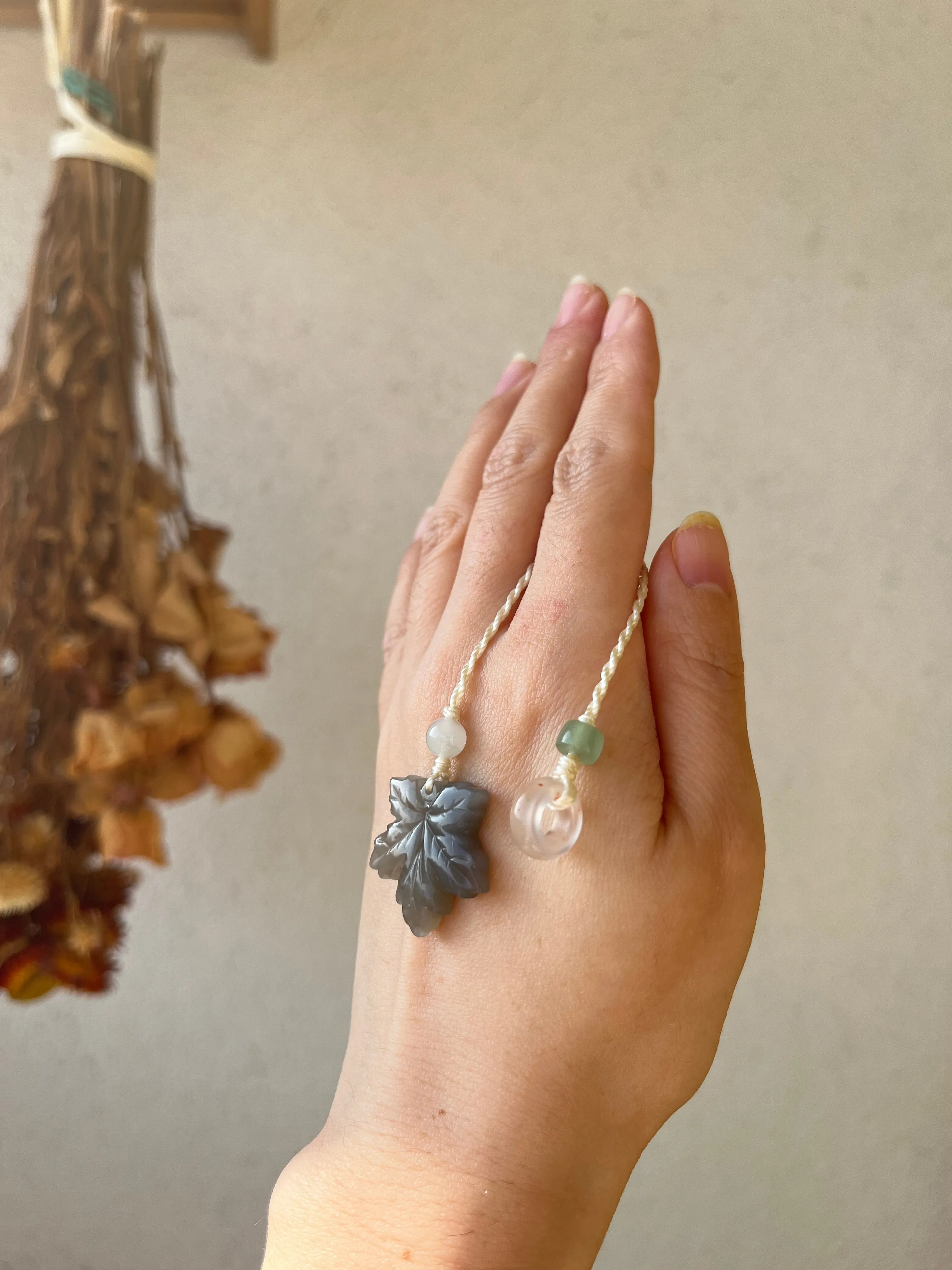 Handmade Phone Charm with a Carved Hetian Jade Maple Leaf and a Nanhong Agate Lucky Ring