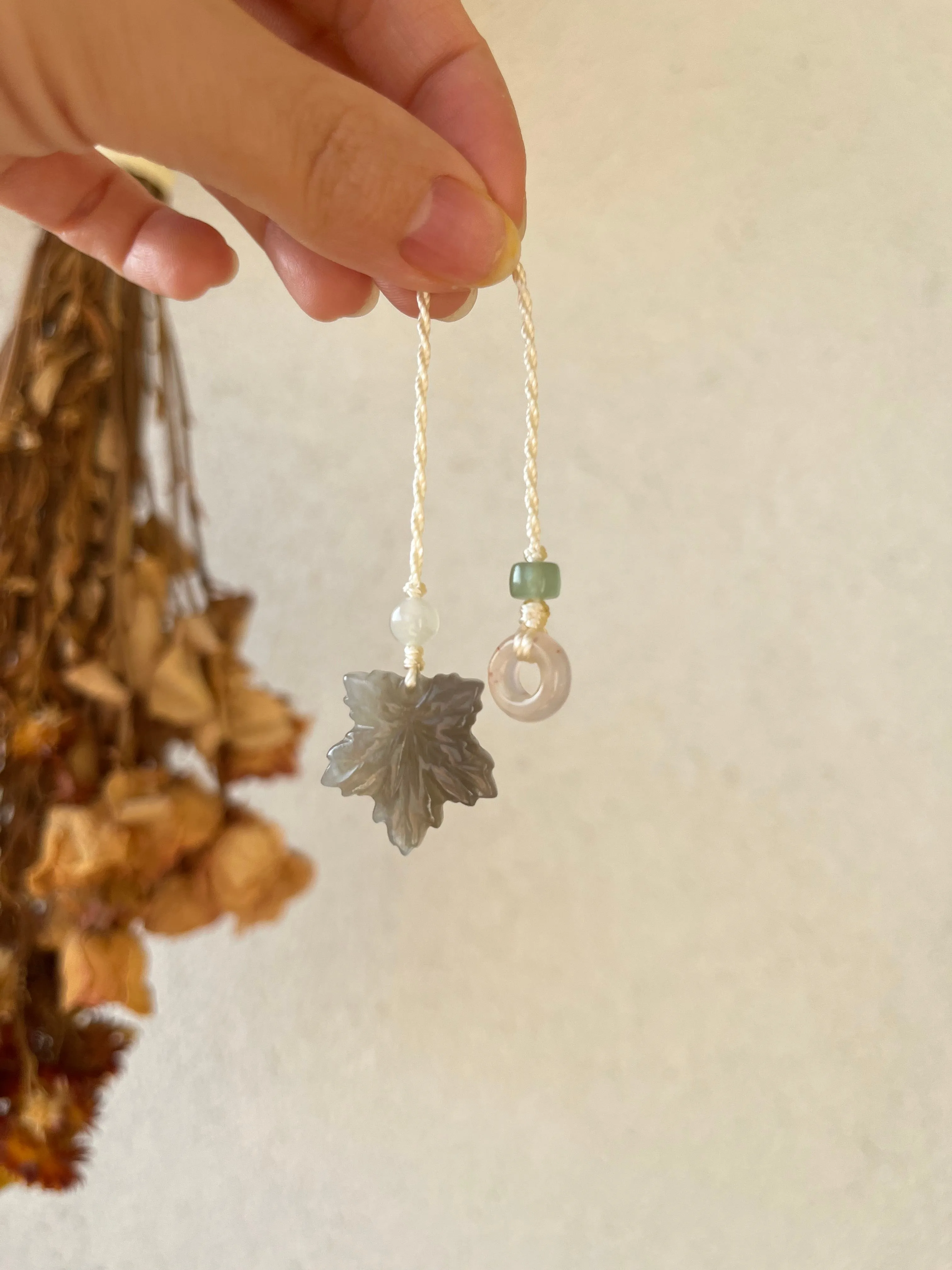 Handmade Phone Charm with a Carved Hetian Jade Maple Leaf and a Nanhong Agate Lucky Ring