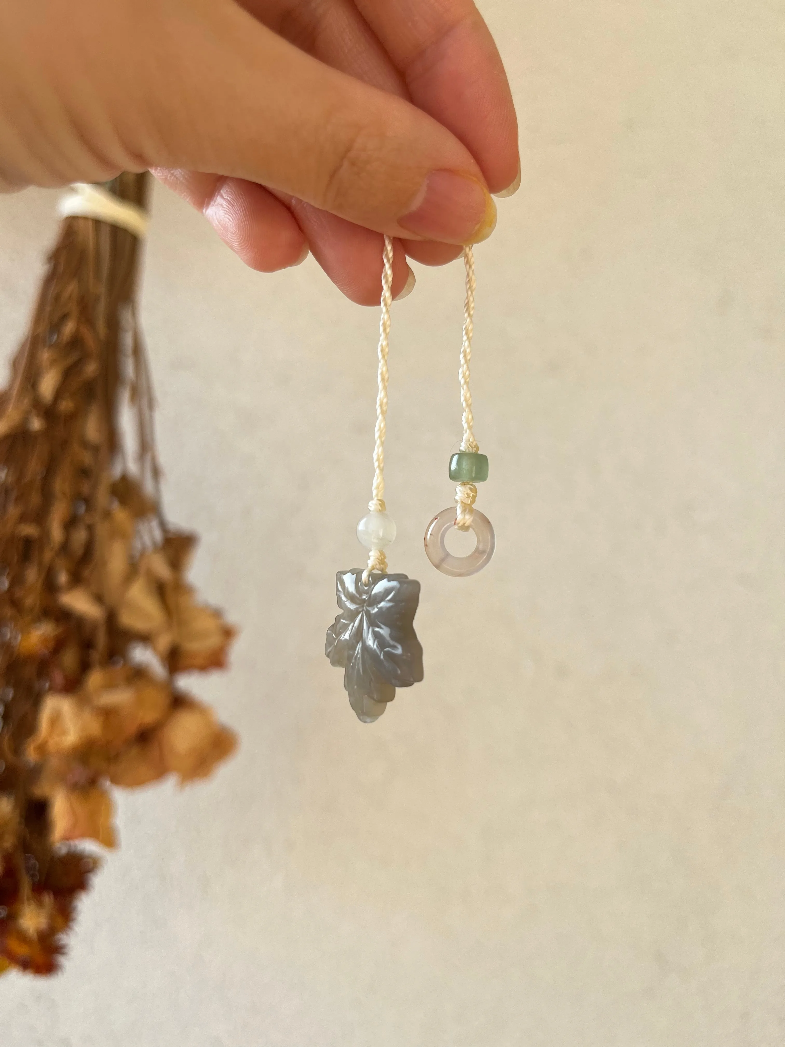 Handmade Phone Charm with a Carved Hetian Jade Maple Leaf and a Nanhong Agate Lucky Ring