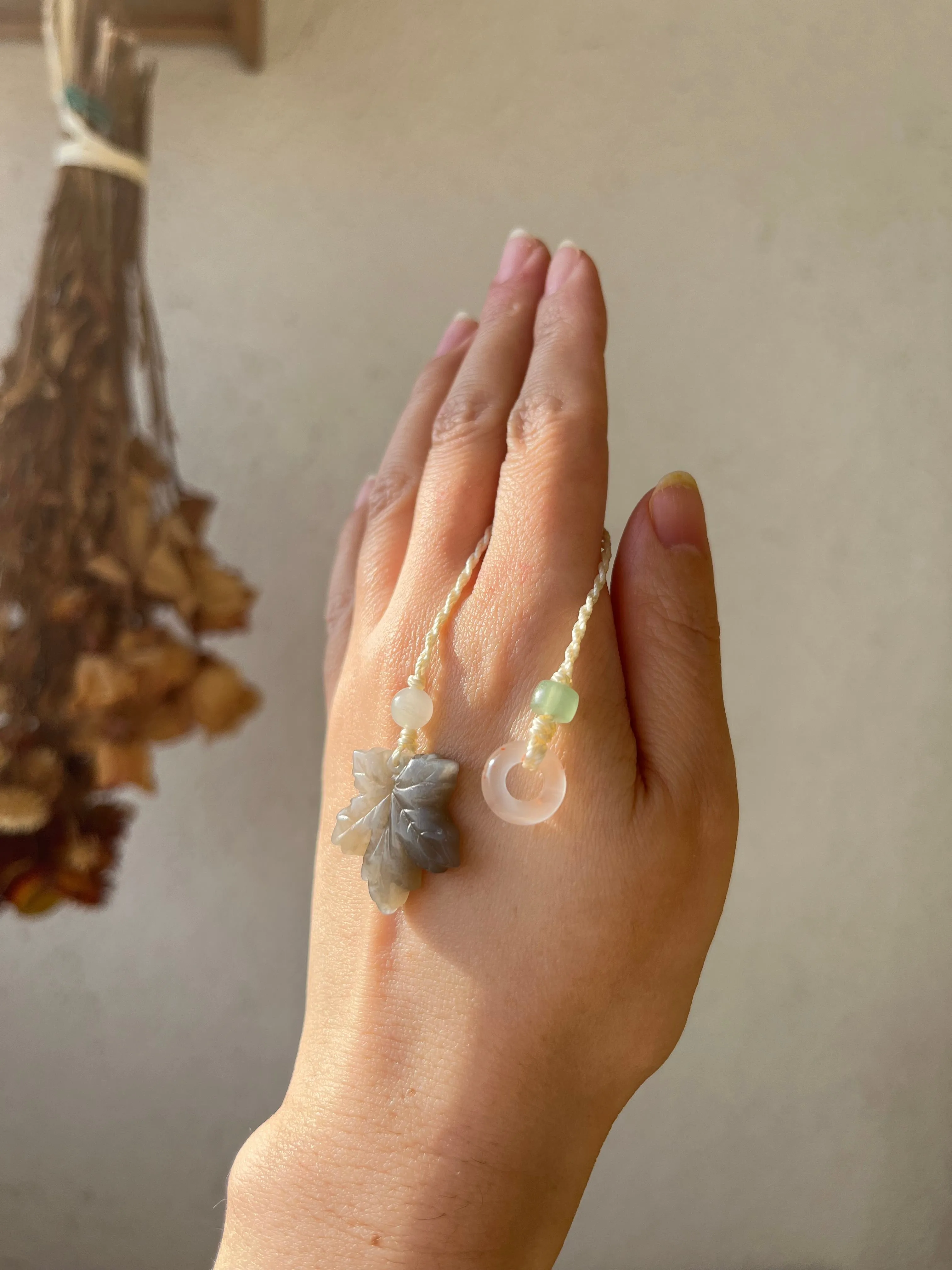 Handmade Phone Charm with a Carved Hetian Jade Maple Leaf and a Nanhong Agate Lucky Ring