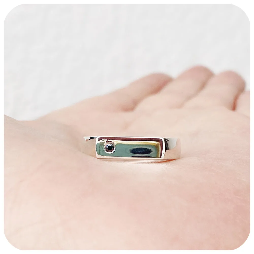 Logan, a Signet Ring with Black Moissanite