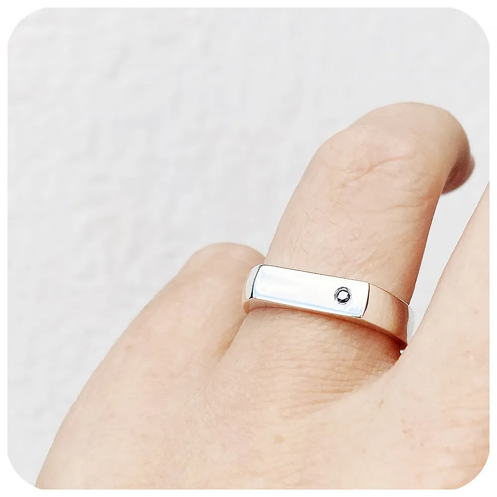 Logan, a Signet Ring with Black Moissanite
