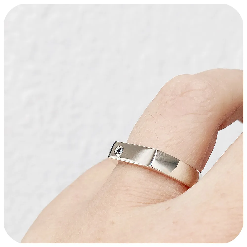 Logan, a Signet Ring with Black Moissanite